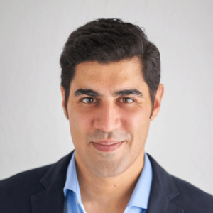 Head shot of Dr. Parag Khanna, founder and CEO of Climate Alpha, pictured against a white background